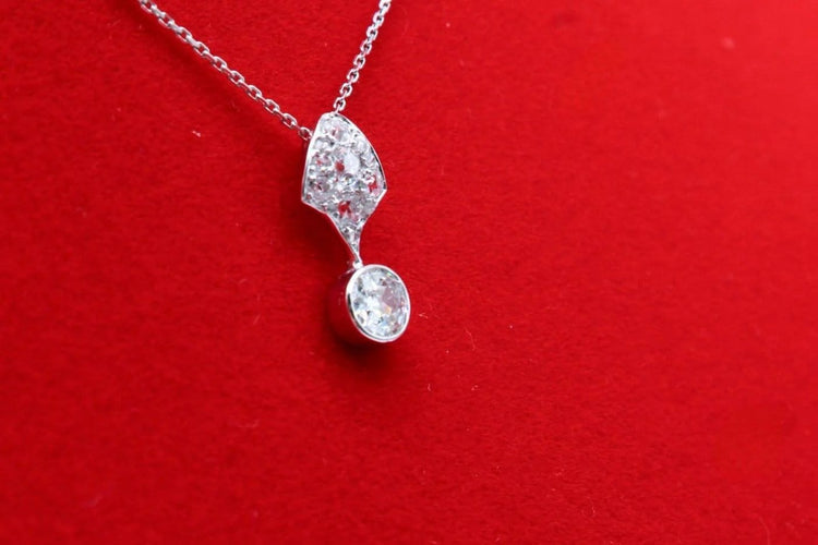 Pendentif Pendentif en platine avec diamants, vers 1925 58 Facettes 240658