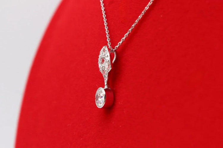 Pendentif Pendentif en platine avec diamants, vers 1925 58 Facettes 240658