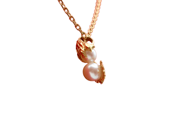 Pendentif Pendentif moderne en or jaune 750 et perles de culture 58 Facettes 240385