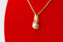 Pendentif Pendentif moderne en or jaune 750 et perles de culture 58 Facettes 240385