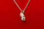 Pendentif Pendentif moderne en or jaune 750 et perles de culture 58 Facettes 240385