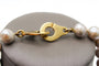 Collier Collier en or jaune et perles grises 58 Facettes 240134