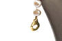 Collier Collier en or jaune et perles grises 58 Facettes 240134