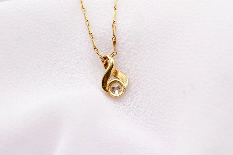 Pendentif Pendentif boucle en or jaune et diamant 58 Facettes 250437