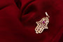 Pendentif Pendentif Main de Fatma en or jaune 18 carats et rubis 58 Facettes 250377