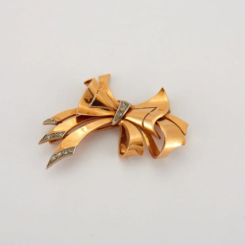 Broche Broche nœud 1940 en or jaune et platine avec diamants 58 Facettes