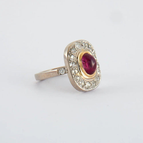 Bague 56 Bague en or jaune et blanc, rubis et diamants 58 Facettes