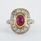 Bague 56 Bague en or jaune et blanc, rubis et diamants 58 Facettes