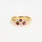 Bague 55 Bague jarretière ancienne en or jaune, rubis et diamants 58 Facettes