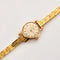 Montre Sygma-Valmon - Montre mécanique dame en or jaune 750 58 Facettes