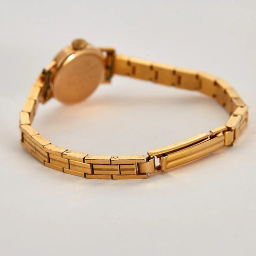Montre Sygma-Valmon - Montre mécanique dame en or jaune 750 58 Facettes