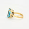 Bague 53.5 Bague topaze bleue taille émeraude en or jaune 18 ct 58 Facettes