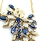 Collier Collier - Motif floral en or jaune avec opale, saphirs et diamants 58 Facettes