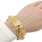 Bracelet Bracelet rigide oriental filigrané en or jaune 18 carats 58 Facettes