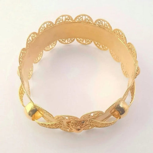 Bracelet Bracelet rigide oriental filigrané en or jaune 18 carats 58 Facettes