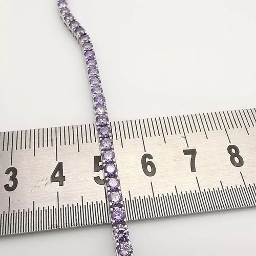 Bracelet Bracelet tennis en or blanc 18K serti d’améthystes 58 Facettes