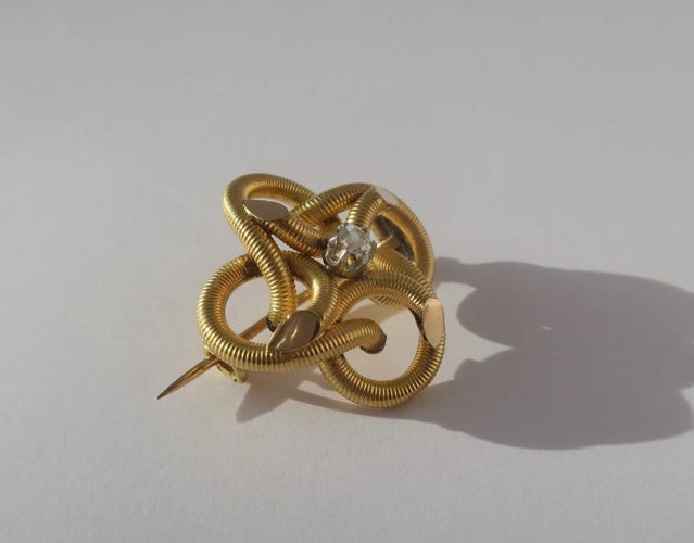 Broche Broche ancienne quadrilobée en or jaune 18 carats et diamant 58 Facettes