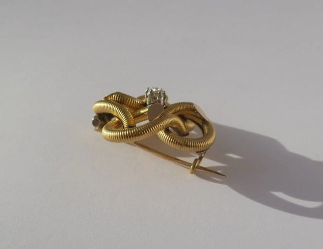 Broche Broche ancienne quadrilobée en or jaune 18 carats et diamant 58 Facettes