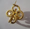 Broche Broche ancienne quadrilobée en or jaune 18 carats et diamant 58 Facettes