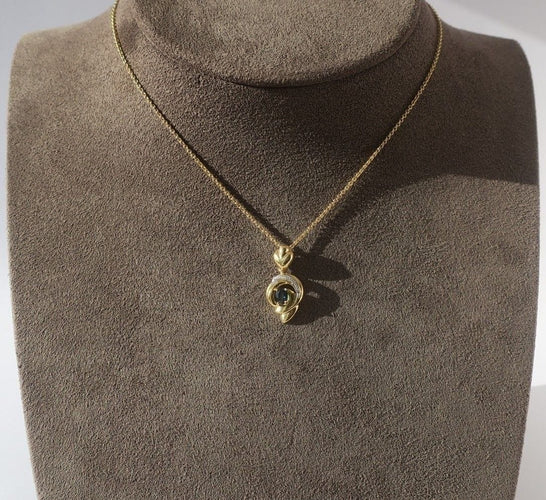 Pendentif Pendentif cœur bicolore en or 18 carats et saphir 58 Facettes