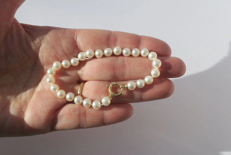 Bracelet Bracelet choker en perles de culture et or jaune 18 carats 58 Facettes