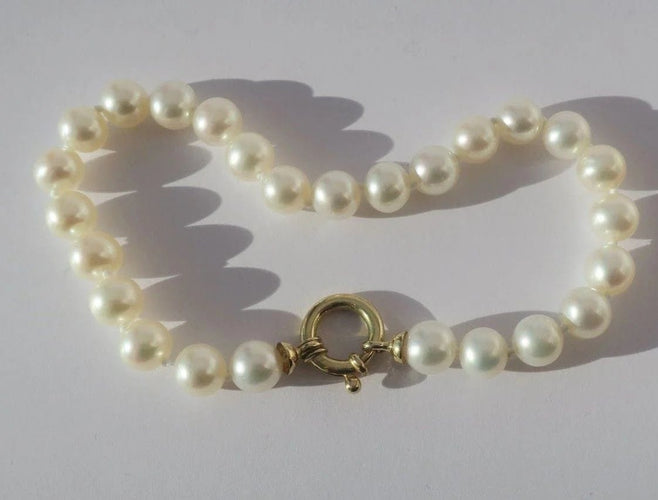 Bracelet Bracelet choker en perles de culture et or jaune 18 carats 58 Facettes