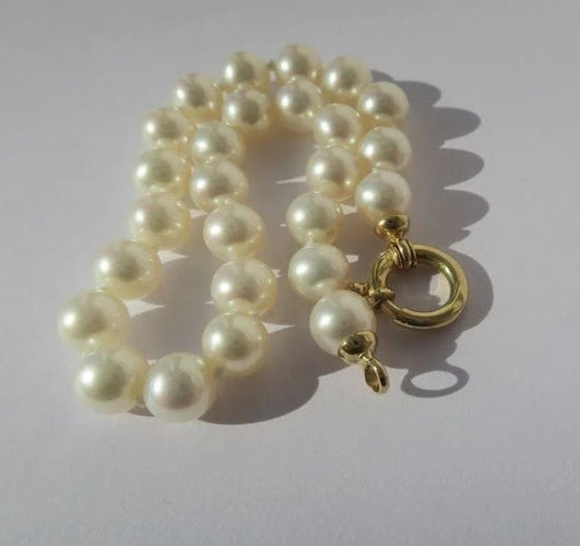 Bracelet Bracelet choker en perles de culture et or jaune 18 carats 58 Facettes