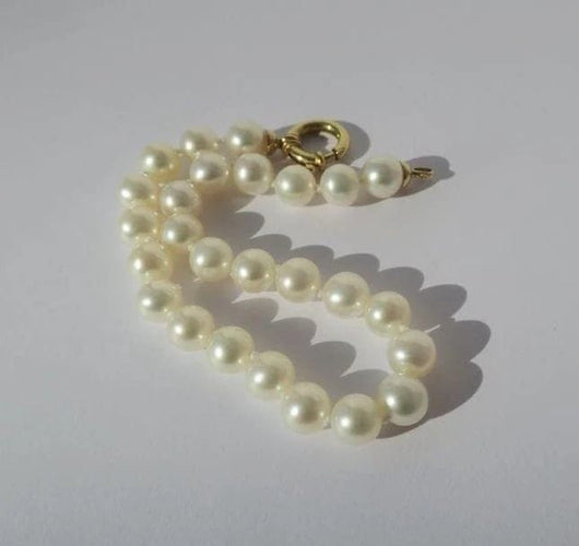 Bracelet Bracelet choker en perles de culture et or jaune 18 carats 58 Facettes