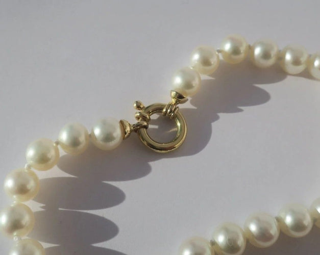 Bracelet Bracelet choker en perles de culture et or jaune 18 carats 58 Facettes