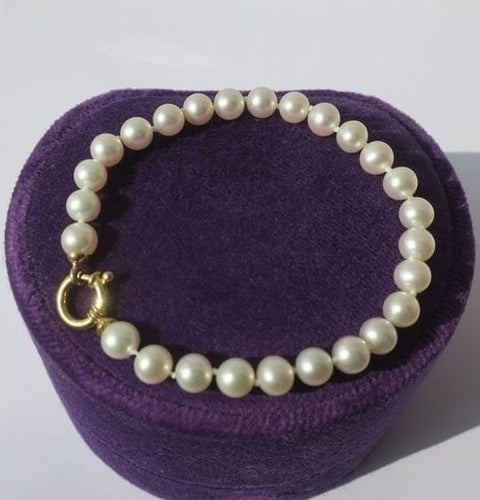 Bracelet Bracelet choker en perles de culture et or jaune 18 carats 58 Facettes