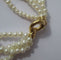 Bracelet Bracelet quatre rangs en or jaune et perles de culture 58 Facettes