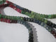 Collier Collier choker - Saphirs, rubis et émeraudes en or jaune 18 carats 58 Facettes