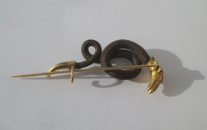 Broche Broche serpent en or rose 18 carats et turquoise, début XIXe 58 Facettes