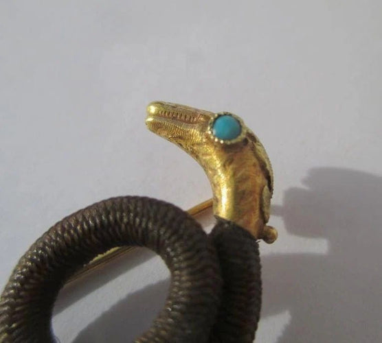 Broche Broche serpent en or rose 18 carats et turquoise, début XIXe 58 Facettes