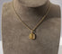 Pendentif GRUN - Médaille pendentif Art déco en or jaune 18 carats et nacre 58 Facettes