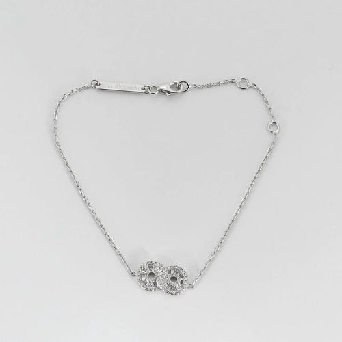 Bracelet Bracelet motif infini en or blanc 18K et diamants 58 Facettes