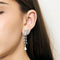 Boucles d'oreilles Boucles d'oreilles pendantes en or blanc 18 carats et diamants 58 Facettes