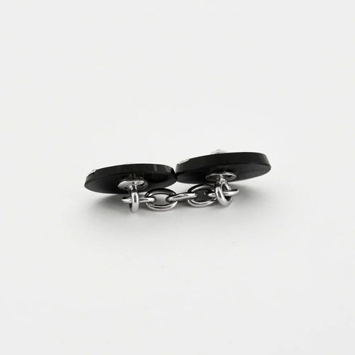 Boutons de manchette Boutons de manchette années 1930 en or blanc, onyx et diamants 58 Facettes P21L12