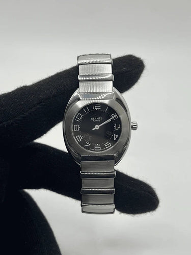 Montre Hermès Espace - Montre en acier, cadran noir, 32 mm 58 Facettes