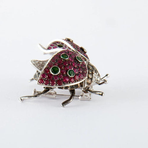 Broche Broche « Coccinelle » en or blanc avec rubis, tsavorites et diamants 58 Facettes