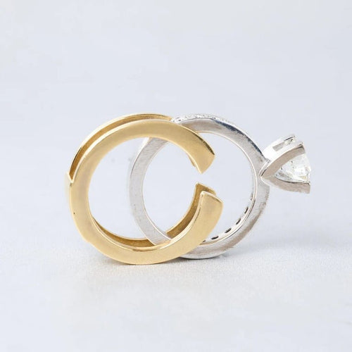 Bague 60 Bague solitaire entourage diamants en or gris et or jaune 18k 58 Facettes 1