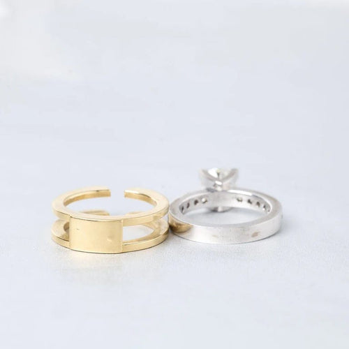 Bague 60 Bague solitaire entourage diamants en or gris et or jaune 18k 58 Facettes 1