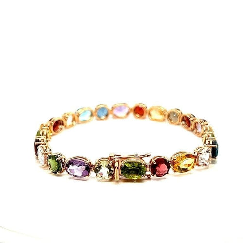 Bracelet Bracelet articulé en or jaune 18 carats et pierres multicolores 58 Facettes