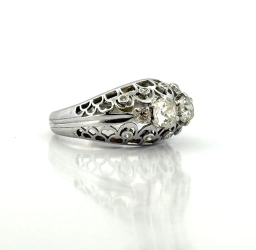 Bague 60 Bague ancienne ajourée en or blanc et diamants 58 Facettes