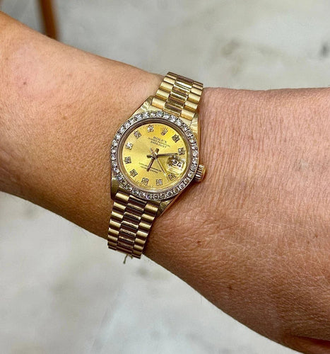 Montre Rolex Oyster Perpetual Datejust Lady - Montre en or jaune 18 ct et diamants 58 Facettes