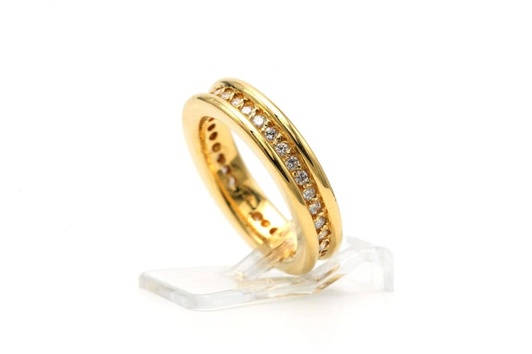 Bague 50 Bague contemporaine en or jaune 18 carats sertie de diamants 58 Facettes 23256