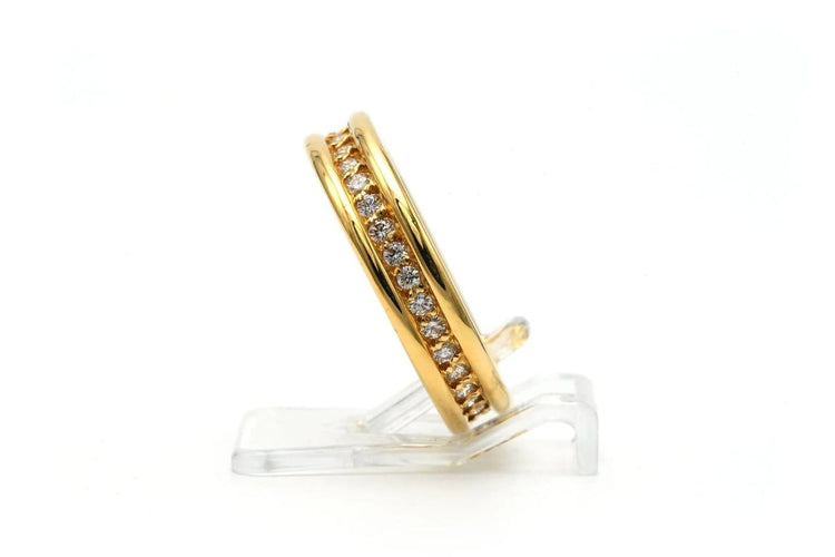 Bague 50 Bague contemporaine en or jaune 18 carats sertie de diamants 58 Facettes 23256