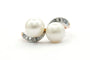 Bague 48 Bague Art nouveau en or jaune et blanc 18 carats, perles et diamants 58 Facettes B413