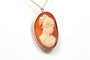 Pendentif Pendentif-broche années 50 en or jaune 14 carats et camée coquillage 58 Facettes 21437