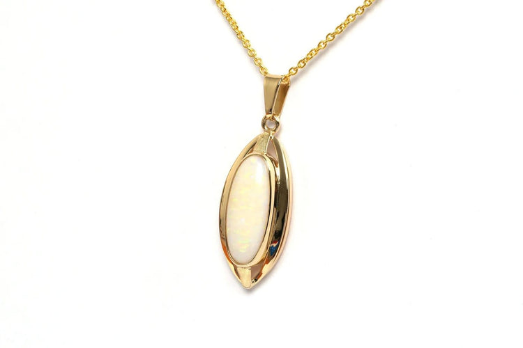Pendentif Pendentif années 70 en or jaune 18 carats serti d’une opale 58 Facettes 21735